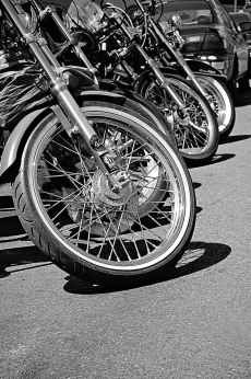 grayscale photo of parked motorcycle